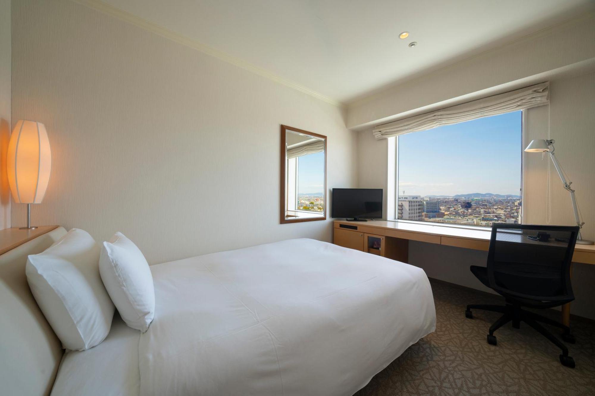 Hotel Associa Toyohashi Exterior photo A room at the hotel