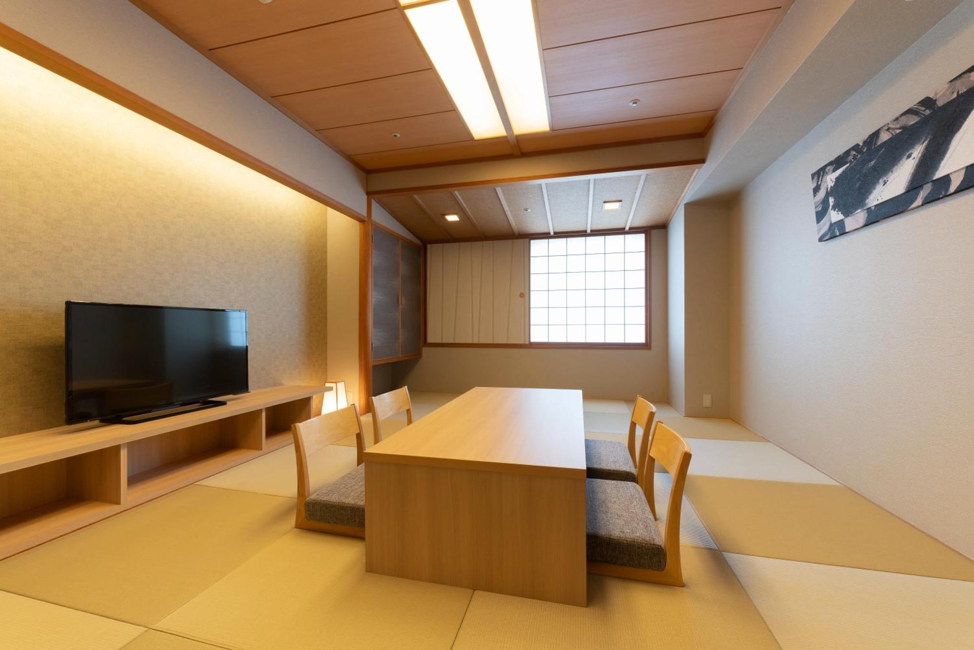 Hotel Associa Toyohashi Exterior photo A room at the Kyoto International Manga Museum